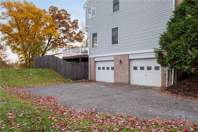 view of home's exterior featuring a garage