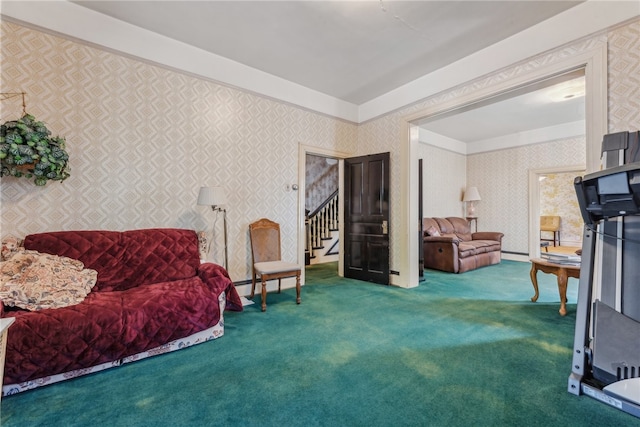 living area featuring a baseboard heating unit and carpet flooring