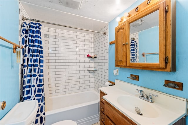 full bathroom featuring vanity, shower / bath combination with curtain, and toilet