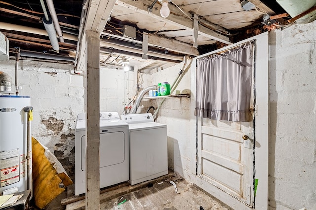 laundry area with water heater and independent washer and dryer