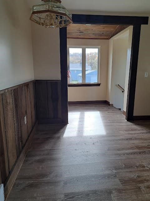 spare room featuring hardwood / wood-style flooring