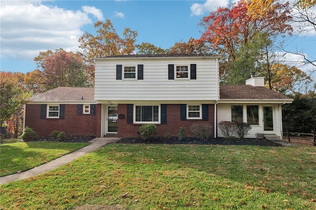 view of property featuring a front yard