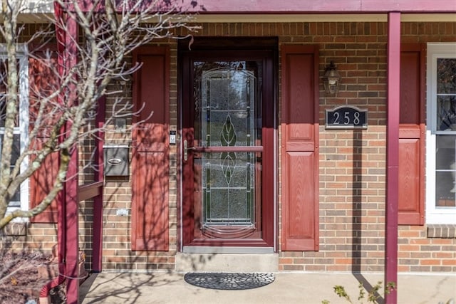 doorway to property featuring a porch