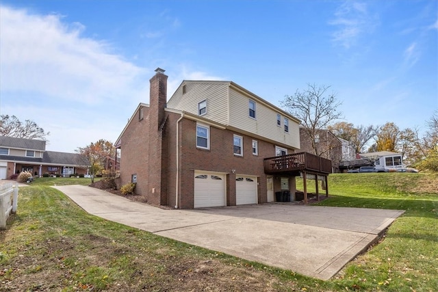 view of property exterior with a wooden deck, a garage, and a lawn