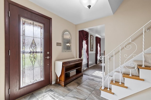 foyer entrance with plenty of natural light