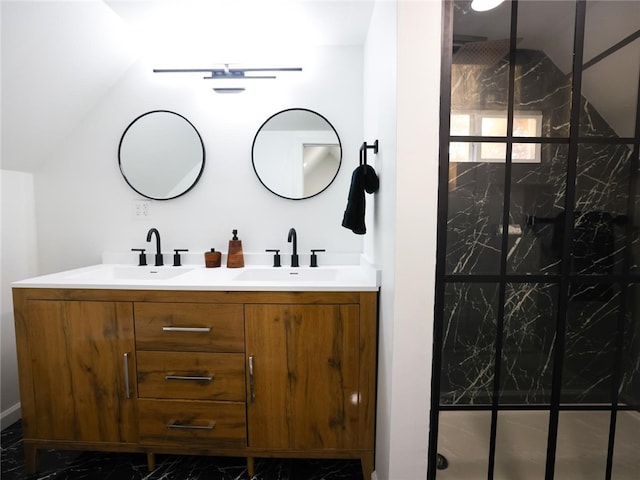 bathroom with vanity and walk in shower