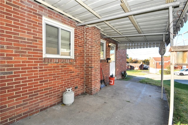 view of patio featuring a carport