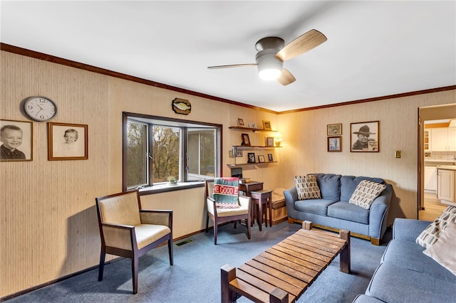 living room featuring crown molding, french doors, light colored carpet, and ceiling fan