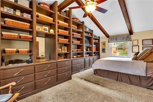 carpeted bedroom featuring vaulted ceiling with beams and ceiling fan