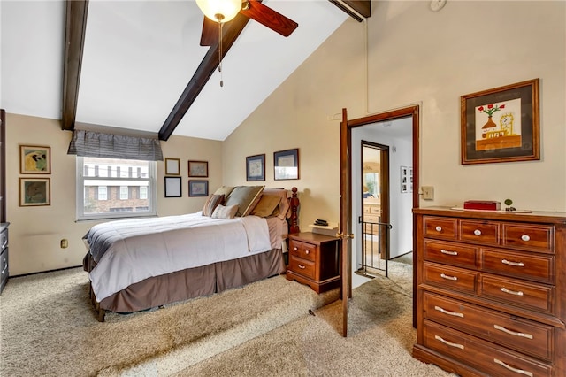 carpeted bedroom with beamed ceiling, high vaulted ceiling, and ceiling fan