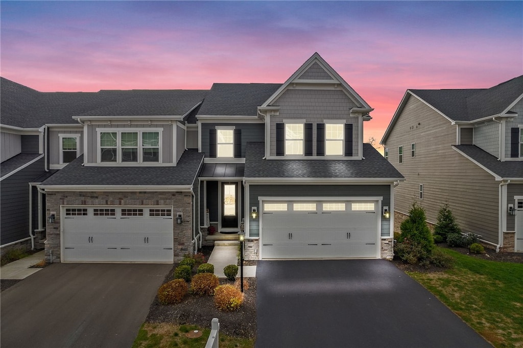 view of front of home with a garage