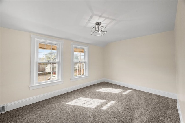 unfurnished dining area with carpet