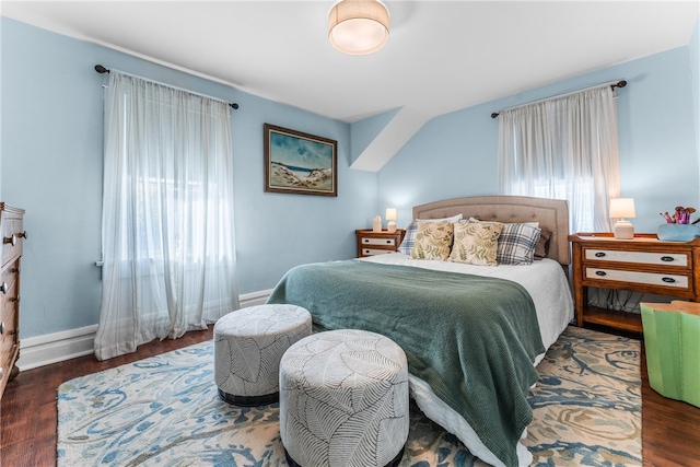 bedroom featuring dark hardwood / wood-style flooring