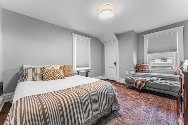 bedroom featuring dark wood-type flooring