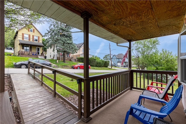 deck featuring a yard