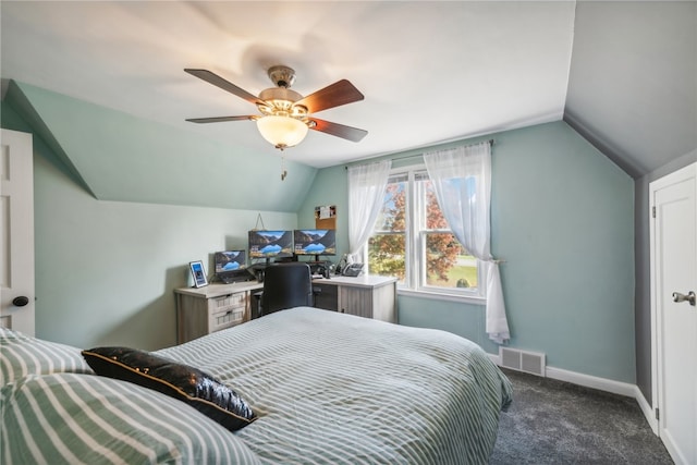 carpeted bedroom with vaulted ceiling and ceiling fan