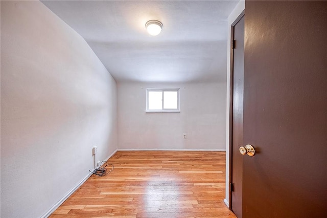 spare room with light hardwood / wood-style floors