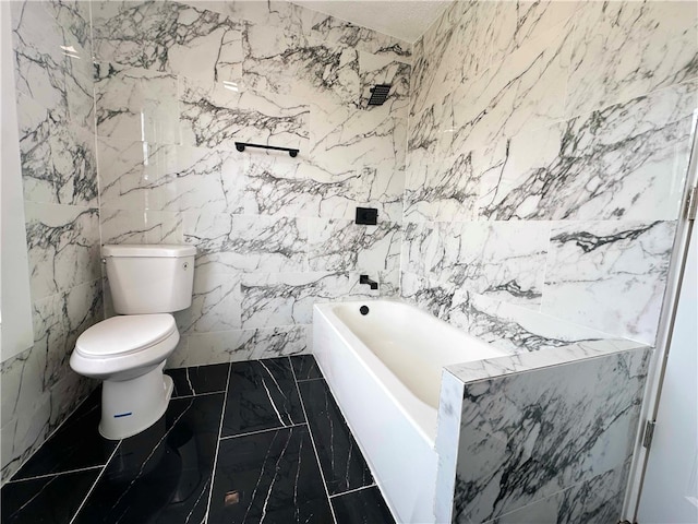 bathroom with a tub, tile walls, and toilet