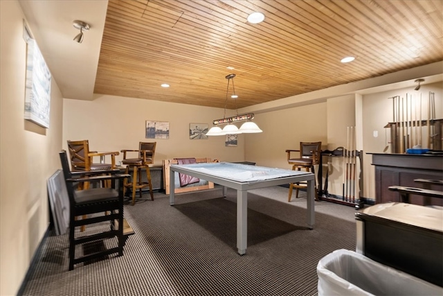 game room featuring dark carpet and wooden ceiling