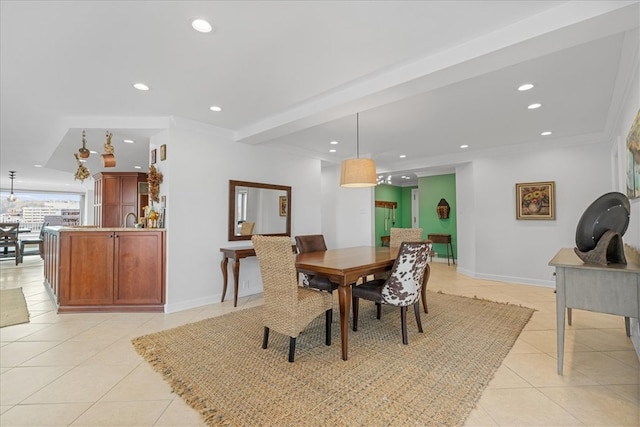 tiled dining space with ornamental molding