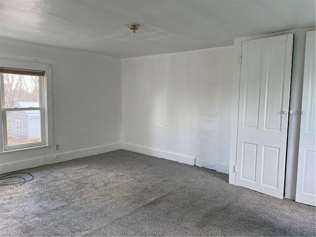 unfurnished room with carpet