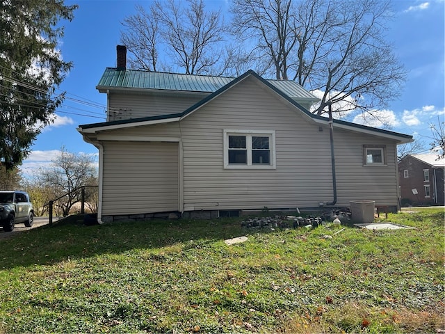 exterior space with a lawn