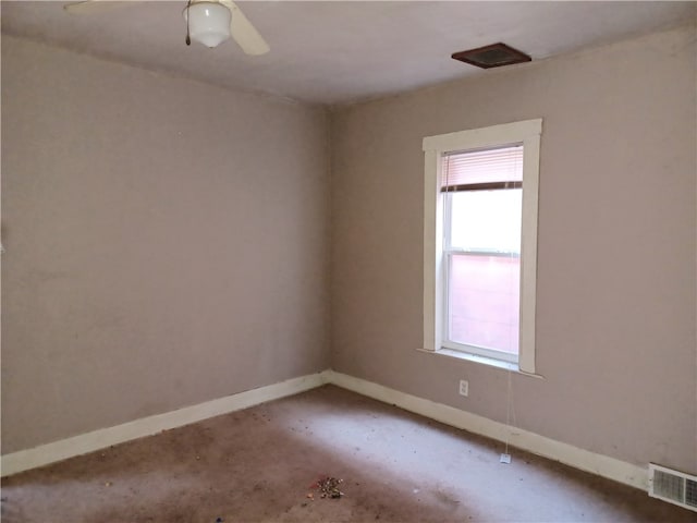 unfurnished room featuring concrete flooring and ceiling fan