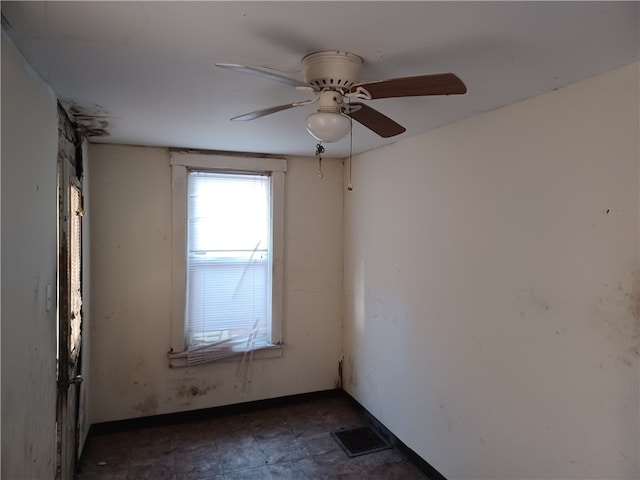 spare room featuring ceiling fan