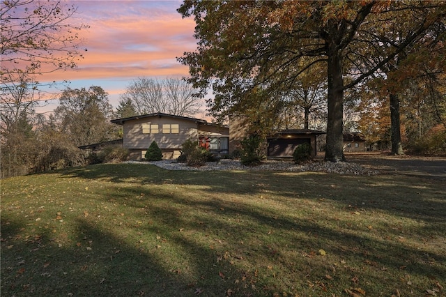 view of front of house with a lawn