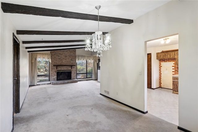 unfurnished living room featuring beamed ceiling, a chandelier, light carpet, and a brick fireplace