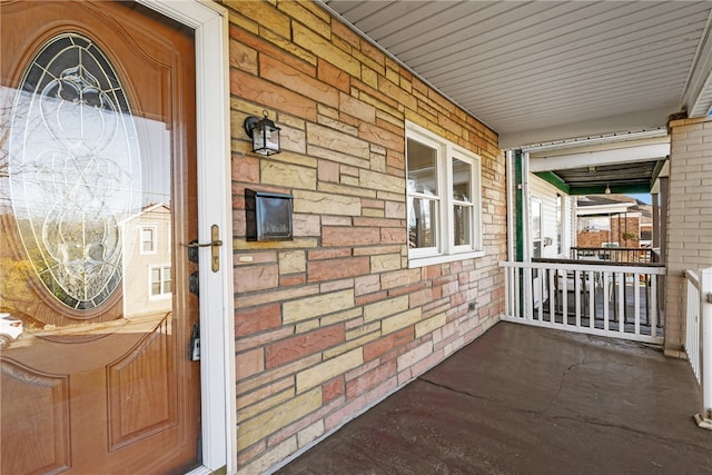 entrance to property with covered porch