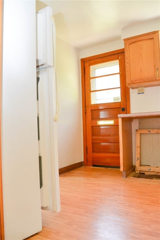 kitchen with light hardwood / wood-style flooring