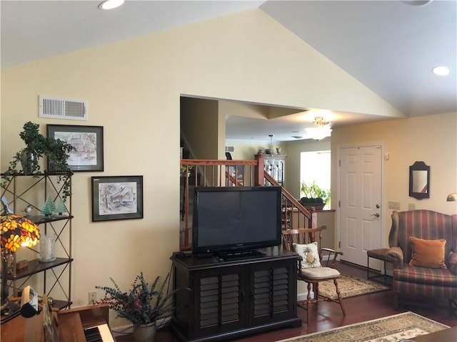 living room featuring visible vents, stairs, lofted ceiling, wood finished floors, and recessed lighting
