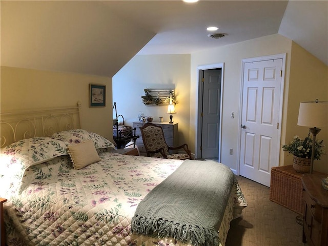 bedroom featuring visible vents, carpet flooring, lofted ceiling, and recessed lighting