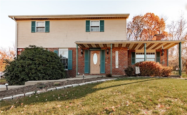 view of front of house featuring a front lawn