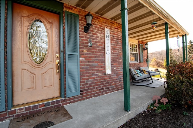 property entrance with a porch