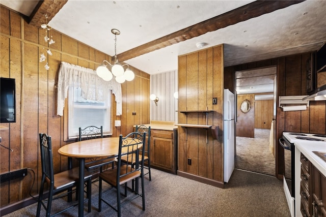 carpeted dining room featuring a notable chandelier, beam ceiling, and wooden walls