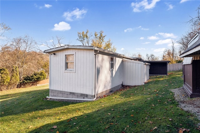 view of outdoor structure featuring a yard