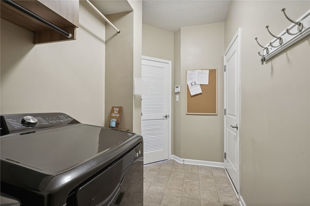 laundry area with washer / clothes dryer