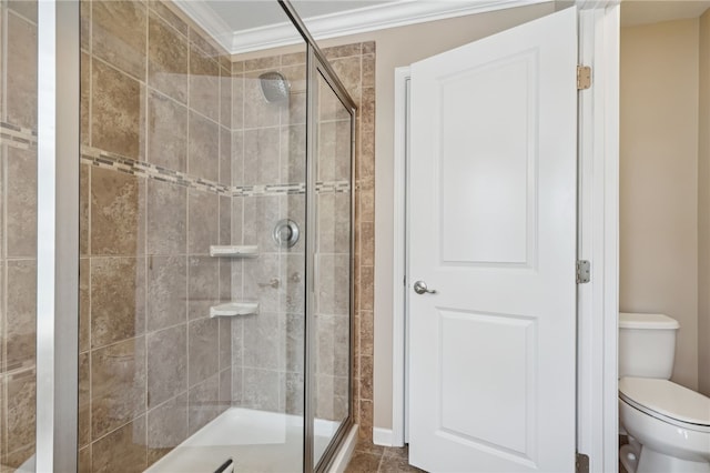 bathroom with a shower with door, ornamental molding, toilet, and tile patterned flooring