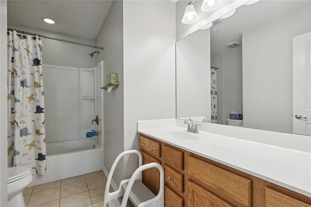 full bathroom featuring vanity, shower / tub combo, toilet, and tile patterned floors