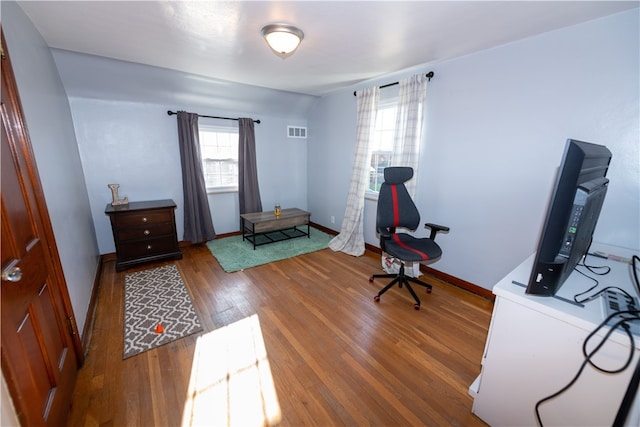 office with wood-type flooring