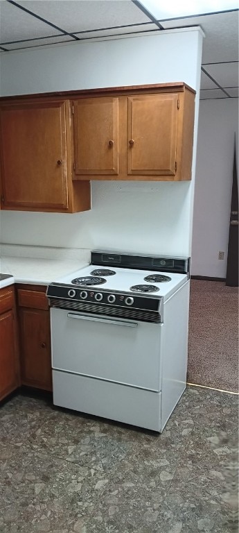 kitchen with a drop ceiling and white electric range oven