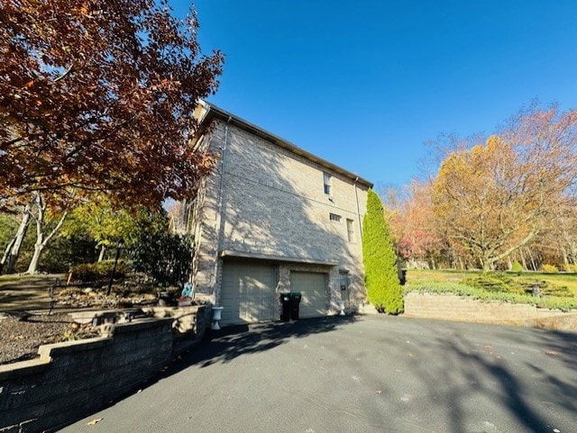 view of home's exterior featuring a garage