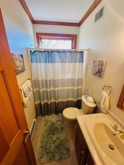 bathroom featuring hardwood / wood-style floors, vanity, ornamental molding, and toilet