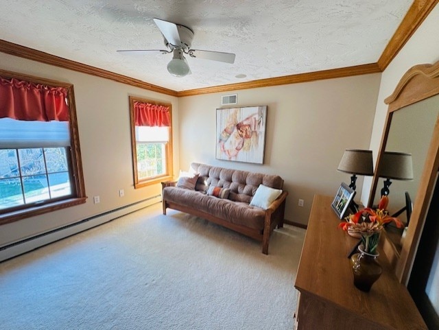 living room featuring light carpet, crown molding, ceiling fan, a textured ceiling, and baseboard heating