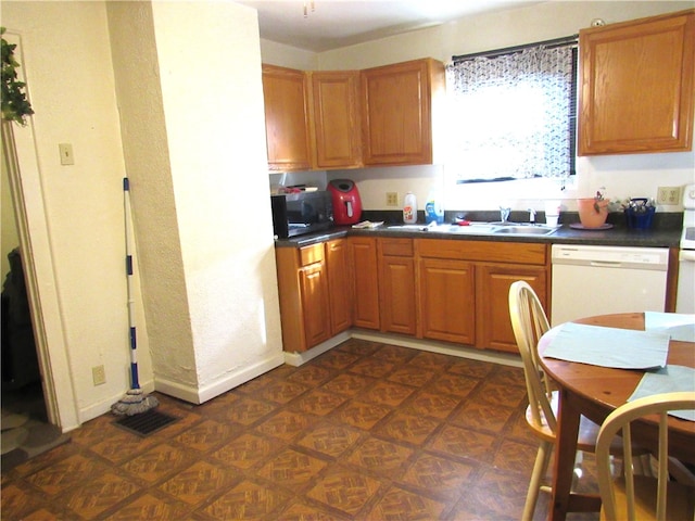 kitchen featuring sink and dishwasher