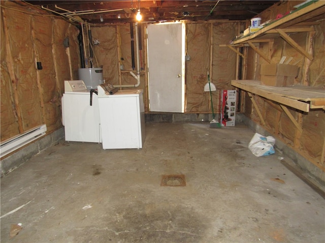 basement with gas water heater, a baseboard heating unit, and separate washer and dryer