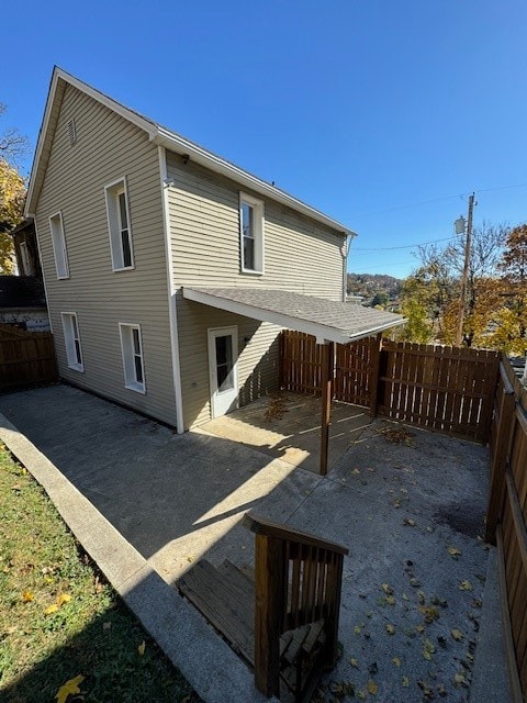 back of house featuring a patio