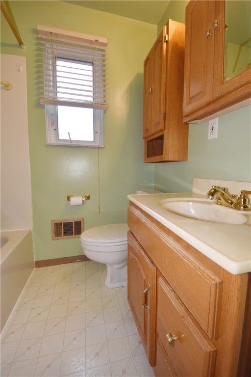 full bathroom featuring shower / bathing tub combination, vanity, and toilet